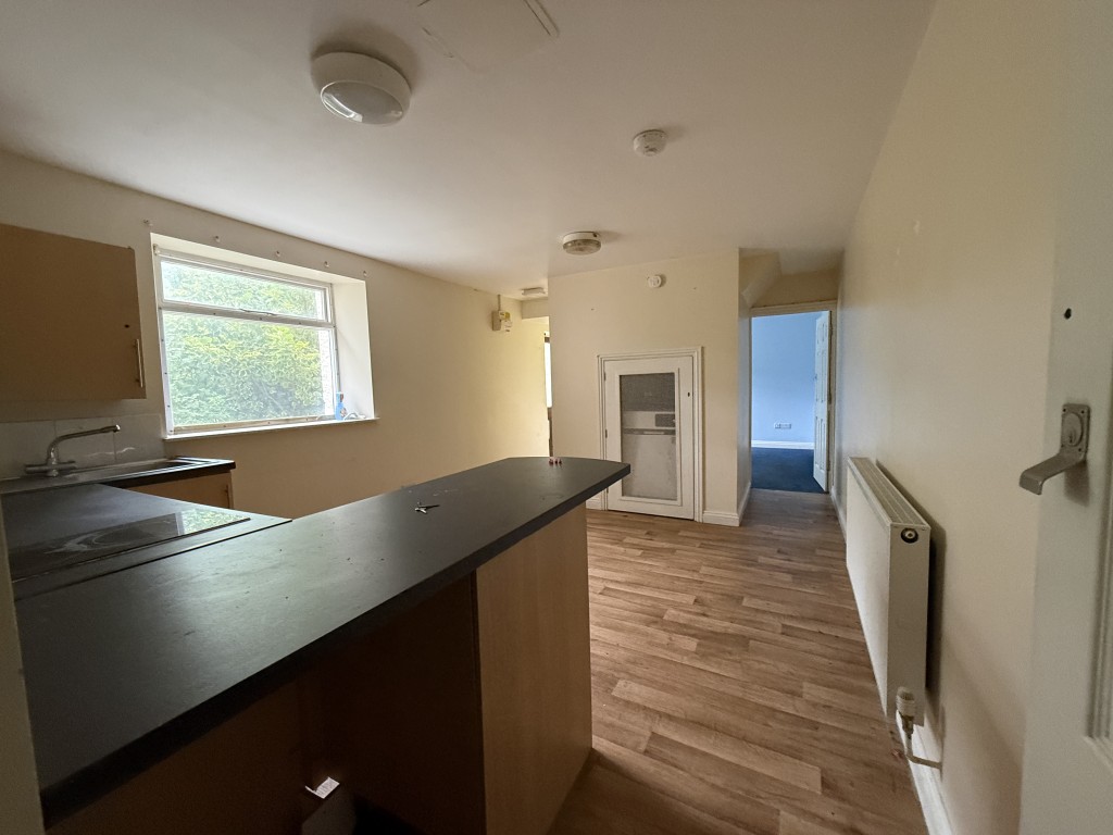 Lot: 133 - SEMI-DETACHED HOUSE IN NEED OF RENOVATION WITH PLANNING FOR DETACHED ANNEXE - One of the kitchens